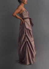 IMPRESSION Mocha A-line gown Iridescent mocha coloured, strapless a-line gown with side and bodice ruching.