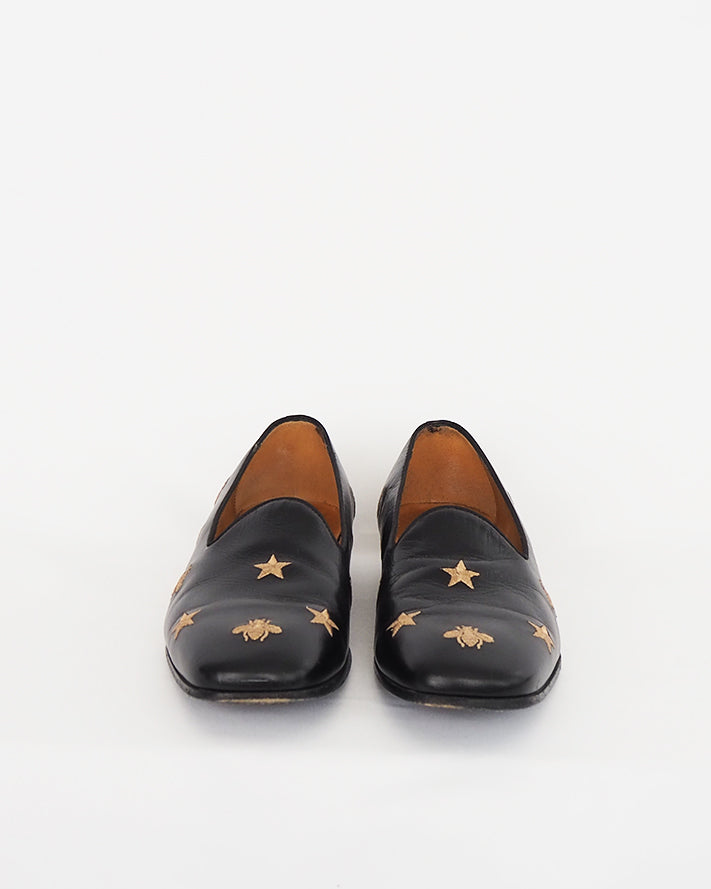 Gucci "Galipoli" embroidered star and bee loafer.