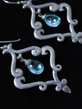 MELISSA CARON - gorgeous sterling silver filigree earrings featuring sparkling aquamarine drops. 