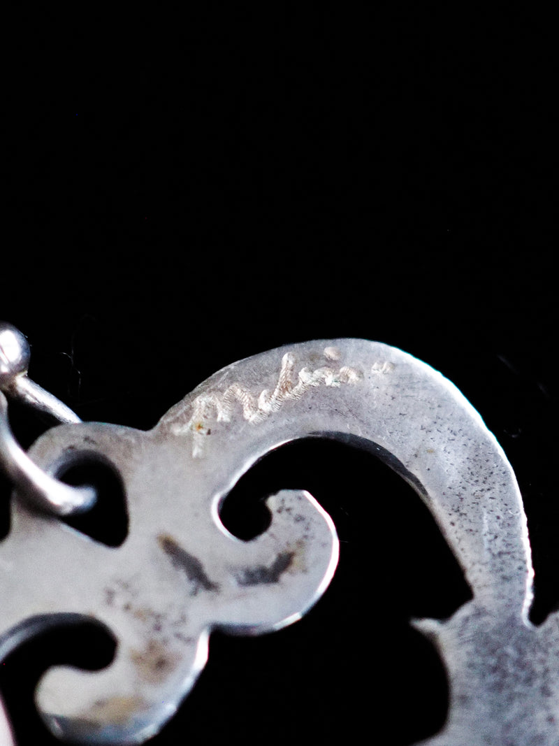 MELISSA CARON - romantic sterling silver filigree earrings featuring shimmering tanzanite drops. 