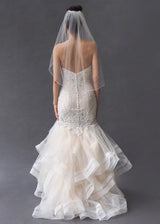 ALLURE BRIDAL GOWN Off-white sweetheart strapless, tulle skirted mermaid style gown with heaps of delicate lace and beading.