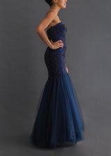 Navy gown with sweetheart neckline, dropped sequin bodice and tulle mermaid skirt