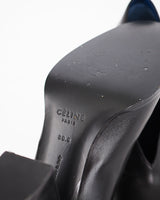 Céline high vamp black leather pumps.