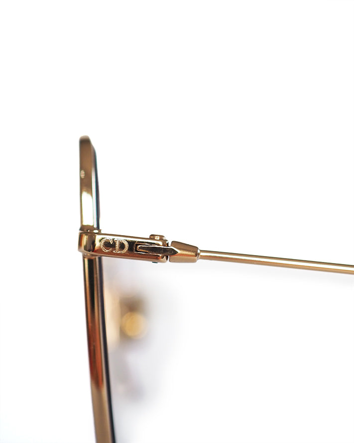 CHRISTIAN DIOR SUNGLASSES Style: Stellaire - Gold-plated titanium oversized square frames with pale mauve polarized lenses.