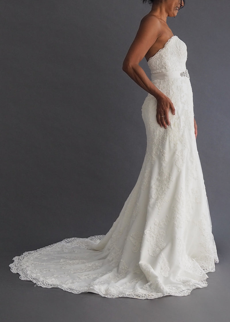 ESSENSE OF AUSTRALIA  -  lace bridal gown Strapless lace a-line gown with sweetheart neckline and rhinestone encrusted ribbon sash.