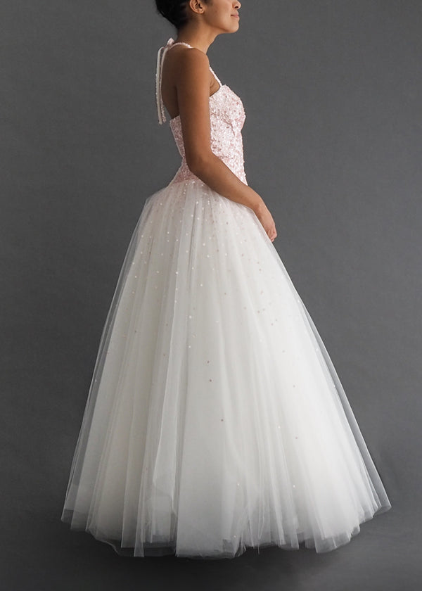 Moira Lee halter neck  ball-gown with baby pink sequin bodice and spray onto full tulle skirt.