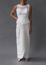 MON CHÉRI - Column bridal gown Off-white column style bridal gown with lace covered bodice, kick-pleat detail and button concealed zipper closure.