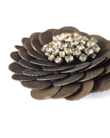 MOSCHINO SEQUIN BROOCH Taupe, tulle-covered large sequins forming a "flower" with rhinestone "pollen" embellishment. 