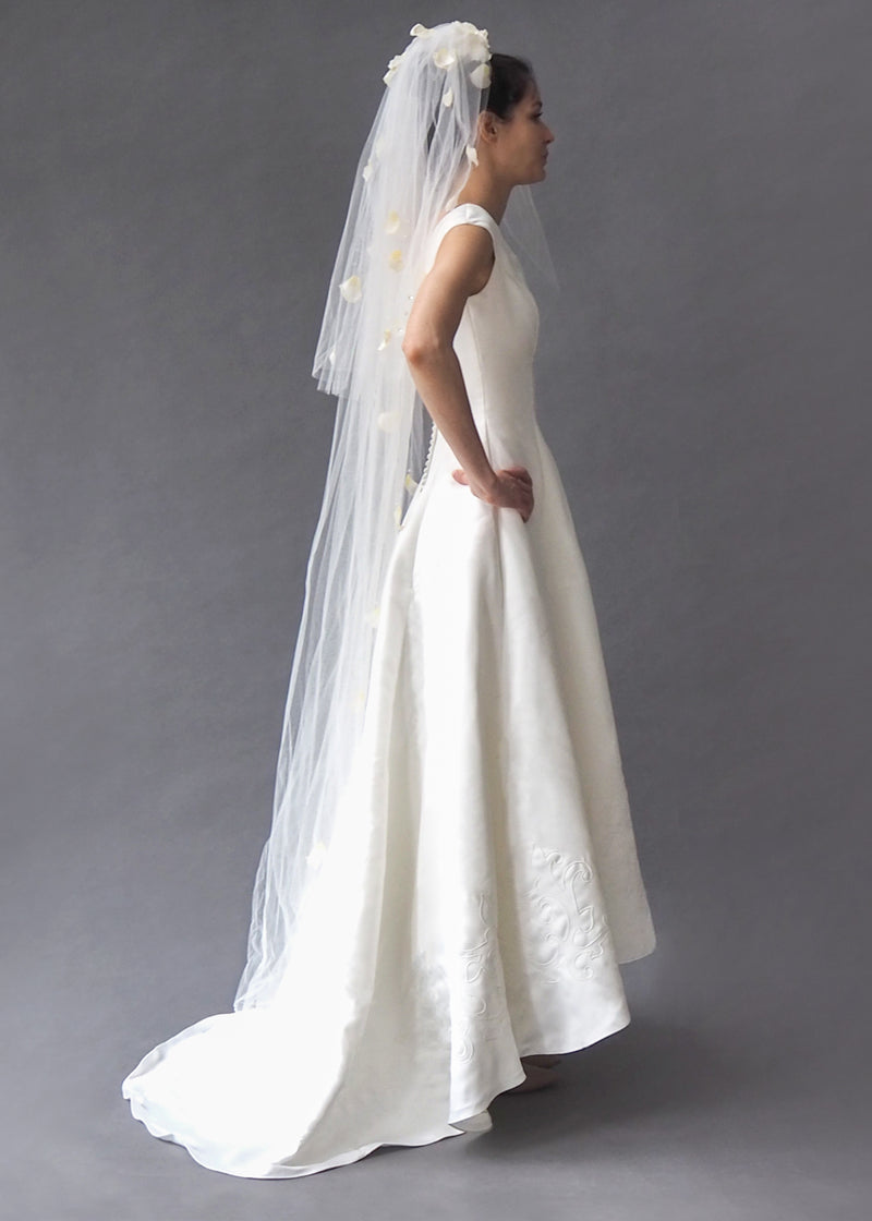 PALOMA BLANCA - bridal gown White satin off-the-shoulder A-line gown with subtle cord embroidery and faux button zip closure.