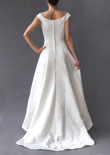PALOMA BLANCA - bridal gown White satin off-the-shoulder A-line gown with subtle cord embroidery and faux button zip closure.