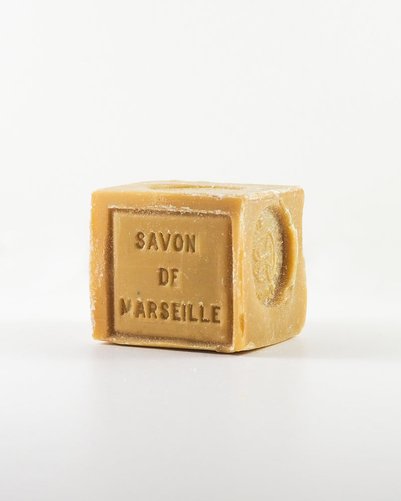 SAVON DE MARSEILLE 300g Direct from the South of France - Savon de Marseille is ideal for sensitive skin . . . and delicate fabrics. This traditional and coveted soap has a 600 year history for good reason. 