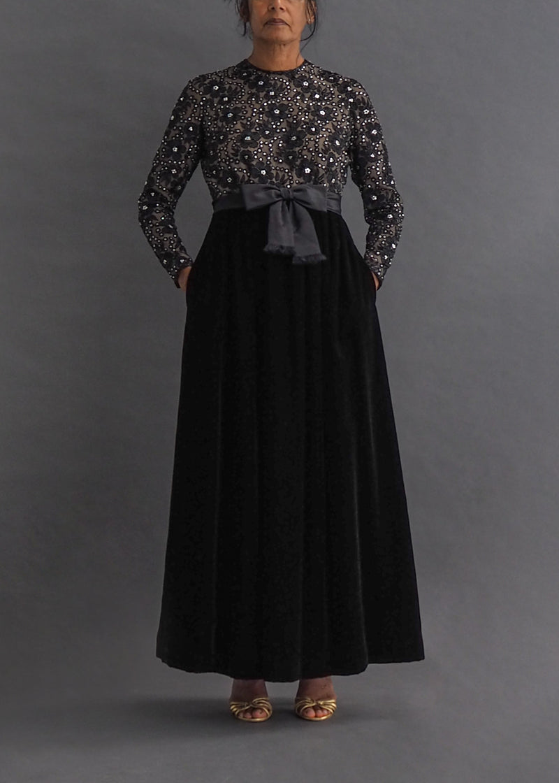 VICTORIA ROYAL LTD - vintage gown Modest round neck, beaded floral, long-sleeve top with pocketed velvet skirt and detachable bow belt.