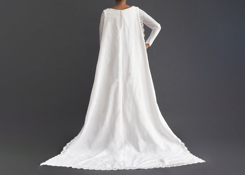 Vintage 1950's ankle-length sleeveless a-line dress with lace stripe detail including removable bolero train and veil headpiece.