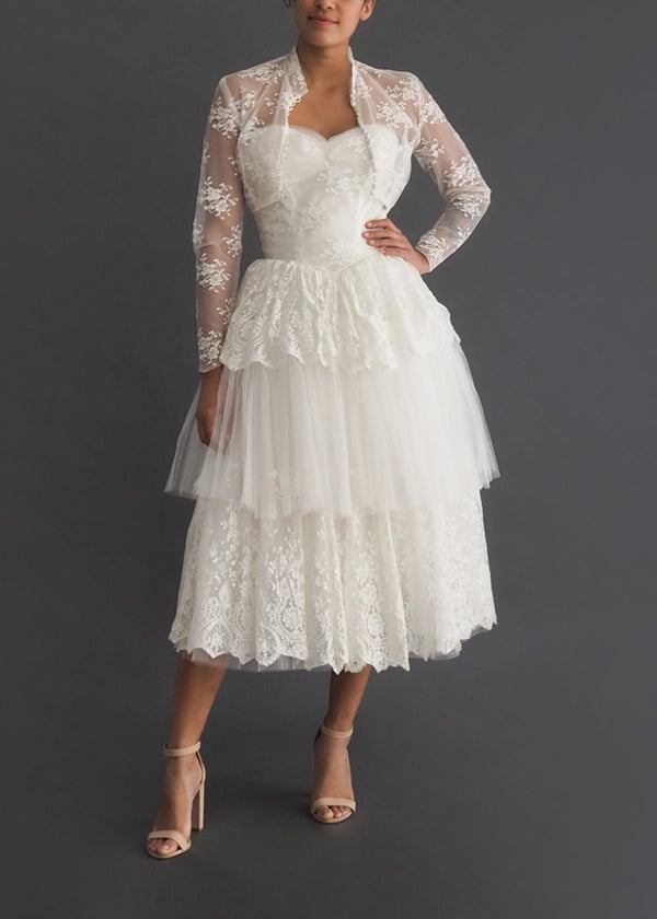 Vintage 1950's cocktail length tiered lace and tulle dress with sweetheart strapless bodice