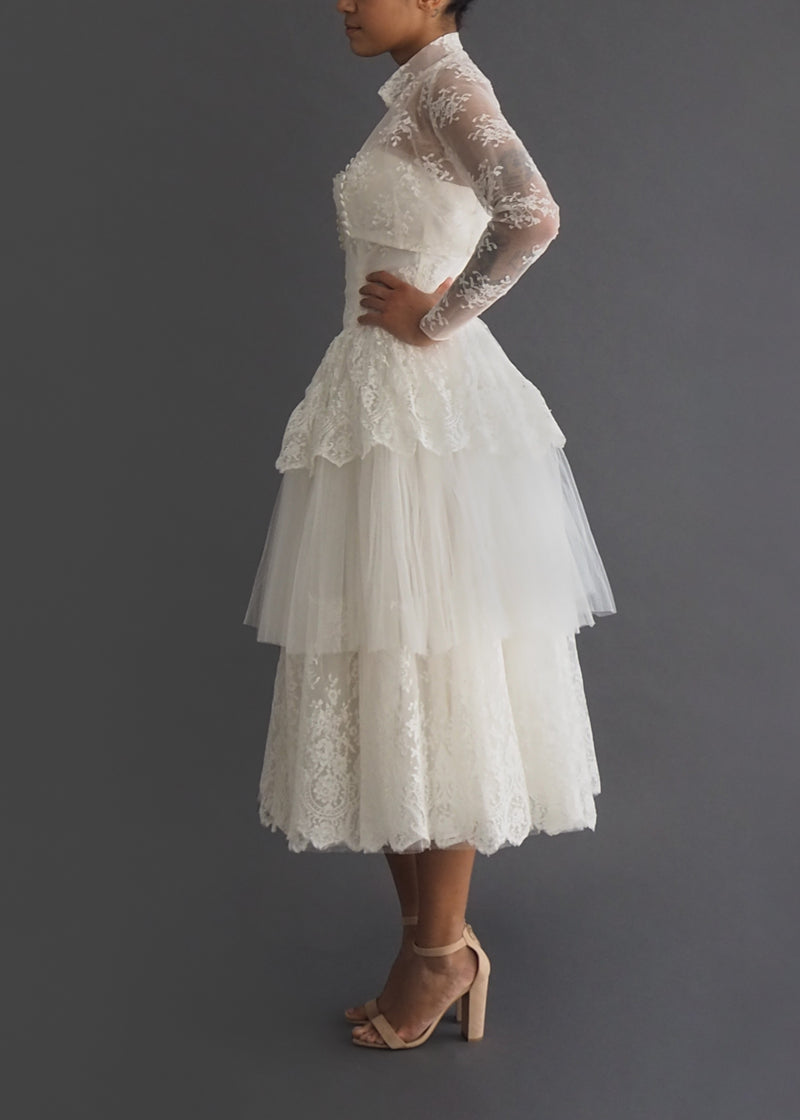 Vintage 1950's cocktail length tiered lace and tulle dress with sweetheart strapless bodice