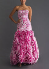 Zurcion Method Prestige gown  with fuchsia animal print sequin drop waist corseted bodice with rosette ruffled skirt and mini train