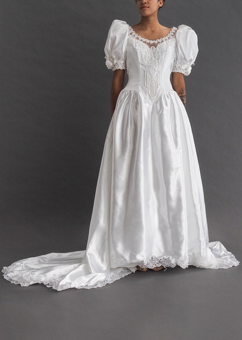 ZURCOIN METHOD PRESTIGE - 80's puff-sleeve bridal gown Vintage satin puff-sleeve gown with lace appliqué and pearl beading, excessive train and detachable bow bustle.