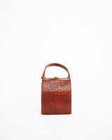 Vintage embossed, rust coloured, alligator purse with single top handle and neat rectangular shape