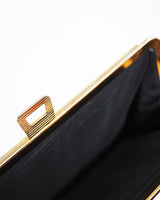 Vintage black corde envelope clutch featuring abstract tone on tone pattern.