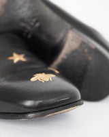 Gucci "Galipoli" embroidered star and bee loafer.