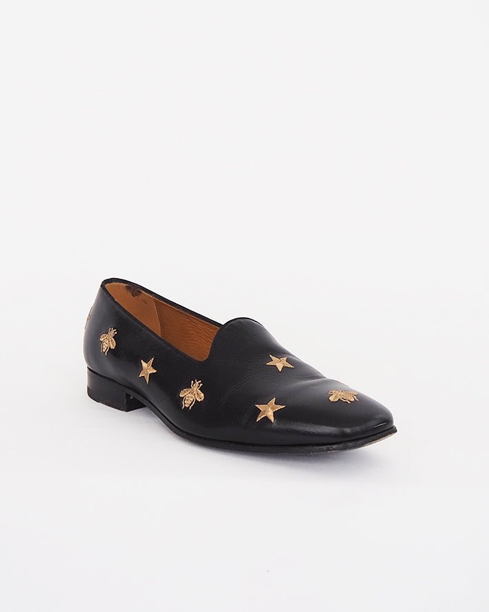 Gucci "Galipoli" embroidered star and bee loafer.