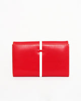 High Art vintage red leather with white piping convertible clutch/shoulder bag including retro metal elastic shoulder strap that neatly tucks away. 